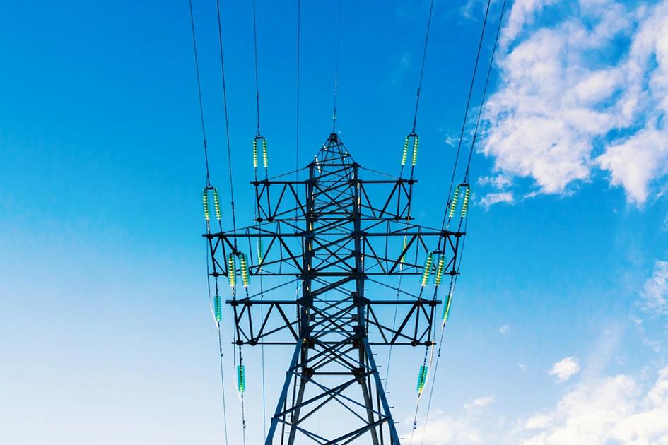 power-transmission-pylon-against-blue-sky.jpg