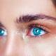 Blå Ögon På En Kvinna