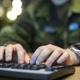 Cyberförsvar, Linköping; Militär Med Händerna På Ett Tangentbord