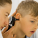 16493692-doctor-examining-boy-s-ear2.jpg