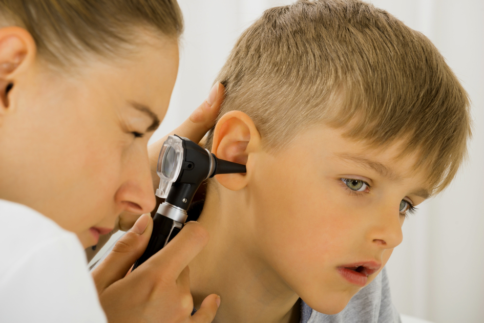 16493692-doctor-examining-boy-s-ear2.jpg