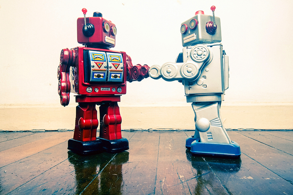 två robotar skakar hand.jpg
